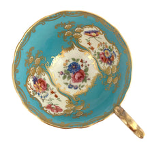 Load image into Gallery viewer, In excellent condition, no chips/cracks/repairs. Maker&#39;s mark.  Teacup measures 4 x 2 1/8 inches  Saucer measures 5 3/4 inches
