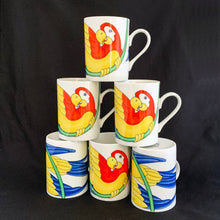 Load image into Gallery viewer, This bright and energetic &quot;Parrot-in-Ring&quot; white ceramic mug is so much fun. This cheeky grinned parrot is brightly coloured in orange, yellow, green and blue. Produced by Fitz &amp; Floyd, Japan, 1979.  In excellent vintage condition, free from chips/cracks. Marked on the bottom &quot;Parrot-in-Ring, Fitz &amp; Floyd Inc., ©MCMLXXIX, FF, 64&quot;  Measures 2 3/4 x 3 3/4 inches  Capacity 11 ounces
