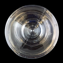 Load image into Gallery viewer, Overhead view of the clear glass pedestal of the Partylite pineapple fairy lamp, showing the bottom
