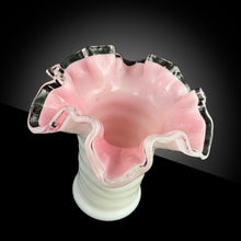 Load image into Gallery viewer, Beautiful hand crafted &quot;Peach Crest&quot; flower vase features a white exterior and a shell pink interior with clear crimped edge and concentric circles or ribbed body. Crafted by Fenton Art Glass, between 1940 to 1943. This compact elegant vase will surely complement any floral display!  In excellent condition, free from chips.  Measures 5 1/2 x 5 inches   
