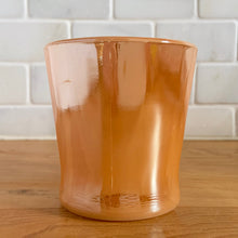 Load image into Gallery viewer, Classic and collectible Fire-King &quot;Peach Lustre&quot; D-handled mug. Made by Anchor Hocking Glass Co., USA. Your morning coffee has never looking better!  In like new condition, free from chips/cracks, minimal wear. Marked with the Anchor Hocking logo, Made in the USA, Ovenproof along with the numbers 47 and 1212.  Measures 3 x 3 1/4 inches  Capacity 10 ounces
