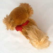 Load image into Gallery viewer, Vintage Peky Pekingese dog stuffed animal features orange amber mohair. He has a jointed head, hand embroidered black nose and mouth, brown glass eyes with black pupils. On its neck is a red ribbon with the original round red, blue and yellow tag bearing the name Peky. Ear has Steiff&#39;s silver script button, with remnants of the yellow tag. Crafted by Steiff, Germany 1959 - 1964. A must-have for any Steiff or stuffie collector! In excellent condition. Measures 4 inches or 10cm tall
