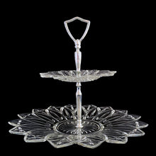 Load image into Gallery viewer, An outstanding and hard to find vintage two-tiered Petal clear glass tidbit serving tray featuring a decorative silver toned metal stem plus D-shaped handle. Crafted by Federal Glass, USA, circa 1960s. This elegant serving piece will look stunning filled with treats on any dessert table. Perfect for weddings, showers, high tea and entertaining at home.

In excellent condition, no chips, minor wear to the metal stem.

Measures approximately 11 1/2 x 9 5/8 inches
