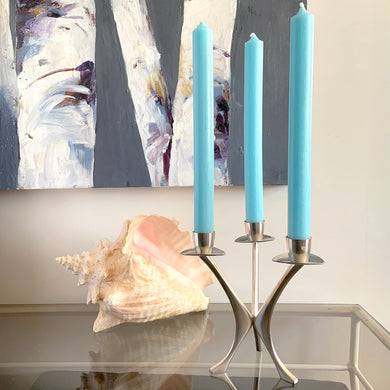 Vintage modernist pewter 3-arm candelabra features a sculptural atomic design that holds three taper candles. Crafted by Brodrene Mylius (BM), Norway, 1960s. An excellent example of mid-century Scandinavian decor.

In excellent condition. Maker's mark, Pewter B M Norway 36500.

Measures 6 x 6 x 6 1/2 inches