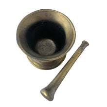 Load image into Gallery viewer, Vintage apothecary pharmacy chemist cast iron mortar and pestle faux painted to appear as brass. Salvaged from the estate of Dale&#39;s Pharmacy on Queen St. East in Toronto, Canada. Makes a great decor piece of prop for photography, TV and movies.  In as found vintage condition. Unmarked.  Mortar measures 4 1/2 x 3 3/4 inches and pestle 6 1/2 inches
