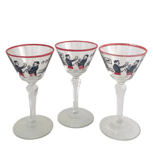Load image into Gallery viewer, Front view of vintage Libbey Pickwick martini glass with faceted stem and Dickensian merrymaker enamel scene, USA 1940s

