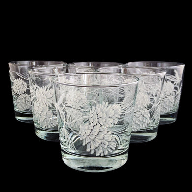 Set of six vintage old fashioned cocktail glasses decorated with raised enamel pinecones frosted with a lovely sparkle. Crafted by Libbey St. Clair, USA, 1960s. These glasses are sure to add a festive flare to your Christmas cocktails!

In excellent condition, no chips.

Measures 3 1/4 x 3 1/8 inches

Capacity 8 ounces