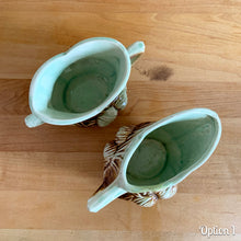 Load image into Gallery viewer, Striking vintage gloss glazed Pinecone sugar and creamer in shades of green and brown. Crafted by McCoy Pottery, 1946. Complete your tea set with this rare set, a must for any McCoy art pottery collector. Makes a nice complement to your Christmas, cottage or lodge decor!

Option 1: Creamer measures 5 5/8 x 3 1/4 x 2 7/8 inches. Sugar measures 5 1/2 x 3 3/8 x 2 3/4 inches. In excellent condition, no chips/cracks/repairs, age-related crazing. Maker&#39;s mark.

