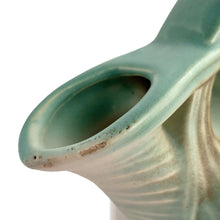 Load image into Gallery viewer, Striking vintage matted glazed Pinecone teapot in shades of green and brown. Crafted by McCoy Pottery, 1946. This rare teapot is must for any McCoy art pottery collector and a nice complement to your Christmas, cottage or lodge decor!

In good vintage condition, chip at spout, no crazing/cracks/repairs, Maker&#39;s mark on the bottom.

Measures 9 3/4 x 6 1/4 x 6 1/4 inches
