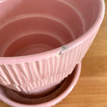 Load image into Gallery viewer, Highly collectible vintage mid-century pink basketweave ceramic planter with attached underplate. Crafted by McCoy Pottery, 1950s. The perfect home for your favourite houseplant or succulent and a must-have for any art pottery collector!

In excellent vintage condition, no chips/cracks/repairs, age-related crazing. Maker&#39;s mark.

Measures 6 1/2 x 5 5/8 inches
