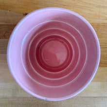 Load image into Gallery viewer, Highly collectible vintage mid-century pink basketweave ceramic planter with attached underplate. Crafted by McCoy Pottery, 1950s. The perfect home for your favourite houseplant or succulent and a must-have for any art pottery collector!

In excellent vintage condition, no chips/cracks/repairs, age-related crazing. Maker&#39;s mark.

Measures 6 1/2 x 5 5/8 inches
