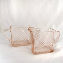 Load image into Gallery viewer, Pretty pink depression glass creamer and sugar in the classic &quot;Chevron&quot; pattern. Produced by Hazel-Atlas Glass, circa 1930. Perfect to add the &quot;pretty&quot; factor to your tablescape.  In good vintage condition. Creamer has minor flea bite to the rim. Sugar is free from chips.  Measures 3 inches
