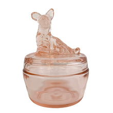 Load image into Gallery viewer, Vintage Jeannette Glass pink depression glass powder jar with lid, front view, rounded barrel-form base in blush pink glass, flat lid topped with a moulded seated Scottie dog finial
