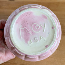 Load image into Gallery viewer, Vintage pink art pottery planter pot featuring a ribbed design and attached underplate. Crafted by McCoy Pottery, USA, circa 1940s. A collectible art pottery planter is perfect for a tiny houseplant, succulents or as part of your McCoy collection!  In vintage condition, several chips a crack. See photos for details.  Measures 4 1/8 x 3 1/2 inches
