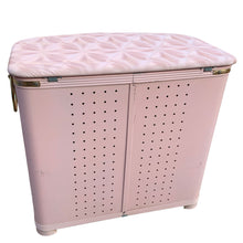 Load image into Gallery viewer, Full rear view of vintage pink floral metal laundry hamper showing ventilation holes, hinges and trim details, 1950s Canada
