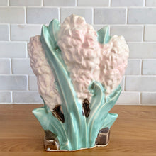 Load image into Gallery viewer, Rare vintage mid-century matte pink Hyacinth vase. Crafted by McCoy Pottery, USA, 1950. This special piece is must for any art pottery collector!

In as found vintage condition, two chips on the leaf tips, no cracks/repairs. Maker's mark.

Measures 6 1/2 x 4 x 8 inches
