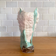 Load image into Gallery viewer, Rare vintage mid-century matte pink Hyacinth vase. Crafted by McCoy Pottery, USA, 1950. This special piece is must for any art pottery collector!

In as found vintage condition, two chips on the leaf tips, no cracks/repairs. Maker's mark.

Measures 6 1/2 x 4 x 8 inches
