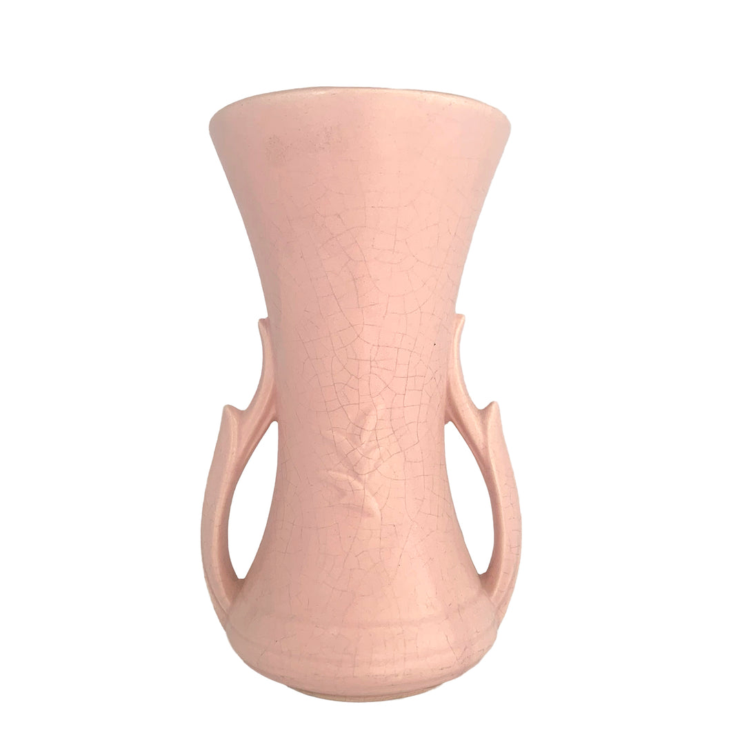 Exceptionally beautiful vintage matte pink art deco trumpet vase, with leaf handles. Crafted by McCoy Pottery, 1940s. This rare vase must for any art pottery collector!

In excellent vintage condition, no chips/crack/repairs with age-related crazing. Maker's mark on the bottom.

Measures 4 3/4 x 4 1/2 x 8 3/8 inches
