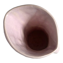 Load image into Gallery viewer, Beautiful vintage Butterfly Line vase glazed in matte lilac, features embossed butterflies and strap handle. Crafted by Nelson McCoy Pottery, early 1940s. This rare pitcher is must for any art pottery collector!

In good vintage condition, no chips, no cracks, no repairs, crazing commensurate with age and manufacturer&#39;s defects. Impressed NM USA mark on the bottom.

Measures 6 x 4 1/2 x 10 1/4 inches

