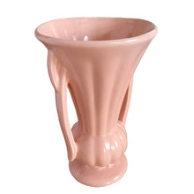 Load image into Gallery viewer, Beautiful vintage matte pink classically shaped handled trumpet vase. Crafted by McCoy Pottery, 1940s. This vase is must for any art pottery collector!

In as found vintage condition, no chips or repairs, tight hairline crack. Maker&#39;s mark on the bottom.

Measures 6 1/4 x 9 1/4 inches
