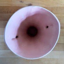 Load image into Gallery viewer, Beautiful vintage matte pink classically shaped handled trumpet vase. Crafted by McCoy Pottery, 1940s. This vase is must for any art pottery collector!

In as found vintage condition, no chips or repairs, tight hairline crack. Maker&#39;s mark on the bottom.

Measures 6 1/4 x 9 1/4 inches
