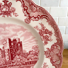Load image into Gallery viewer, Vintage Old Britain Castles dinner plate with pink transferware pattern of a castle with serene surroundings and decorative floral border on a cream ground. Crafted by Johnson Bros., England, post-2003. These are modern replacement plates with the crown backstamp.

Measures 10 inches

In excellent condition, no chips, cracks or repairs.
