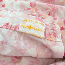 Load image into Gallery viewer, Dress your bed with this vintage twin size &#39;Select Quality&#39; flat sheet featuring a lovely pattern of florals in shades of pink, peach and white. Cotton/Percale blend. Manufactured by Texmade, Canada, circa 1970s. Create a restful slumber with this beautifully designed, high quality textile, or repurpose for crafting or sewing projects!  In excellent condition, free from stains/tears. Colours are vibrant.  Measures 72 x 96 inches
