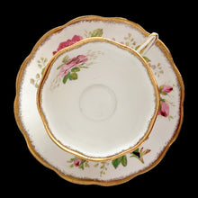 Load image into Gallery viewer, This vintage American Beauty bone china teacup and saucer is so pretty! Both the Countess shaped cup and saucer have a lovely scalloped edge with hand painted roses in shades of pink and green with gold gilt rim. Crafted by Royal Albert, England, 1941 to 1998. A lovely addition to your teacup collection or to give as a gift!

In excellent condition, free from chips, cracks and repairs. Makers marks present.

Teacup measures 3 1/4 x 2 3/4 inches. Saucer measures 5 1/2 inches
