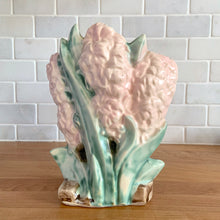 Load image into Gallery viewer, Rare vintage mid-century matte pink Hyacinth vase. Crafted by McCoy Pottery, USA, 1950. This stunning piece is must for any art pottery collector!

In excellent condition, no chips/cracks/repairs. Maker&#39;s mark.

Measures 6 1/2 x 4 x 8 inches
