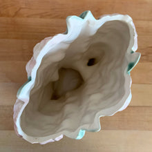 Load image into Gallery viewer, Rare vintage mid-century matte pink Hyacinth vase. Crafted by McCoy Pottery, USA, 1950. This stunning piece is must for any art pottery collector!

In excellent condition, no chips/cracks/repairs. Maker&#39;s mark.

Measures 6 1/2 x 4 x 8 inches
