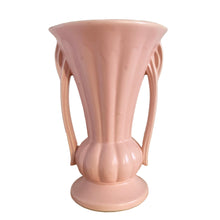 Load image into Gallery viewer, Beautiful vintage matte pink classically shaped handled trumpet vase. Crafted by McCoy Pottery, 1940s. This vase is must for any art pottery collector!

In excellent vintage condition, no chips, no cracks, no repairs. Maker&#39;s mark on the bottom.

Measures 6 1/4 x 9 1/4 inches
