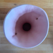 Load image into Gallery viewer, Beautiful vintage matte pink classically shaped handled trumpet vase. Crafted by McCoy Pottery, 1940s. This vase is must for any art pottery collector!

In excellent vintage condition, no chips, no cracks, no repairs. Maker&#39;s mark on the bottom.

Measures 6 1/4 x 9 1/4 inches

