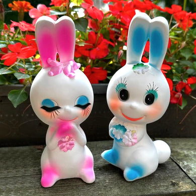 Adorable kitschy pink and blue bunny rabbit couple Bun-Bun chalkware figurines with the sweetest expressions and flower details. Crafted in Taiwan, 1970s. New old stock in original box. Cute doesn't quite capture these sweethearts!

In excellent condition, new in original shipping box.

Measures approximately 2 5/8 x 2 7/8 x 6 3/4 inches
