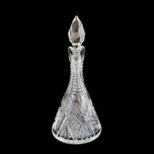 Load image into Gallery viewer, Add a touch of elegance to your tablescape with this antique vintage American Brilliant cut crystal cruet featuring a stunning pinwheel design with faceted stopper and handle. Crafted in the USA, early 20th century. Bring a little sparkle to your home with this lovely cruet.

In excellent condition, no chips.

Measures 3 1/2 x 8 inches
