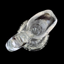 Load image into Gallery viewer, Add a touch of elegance to your tablescape with this antique vintage American Brilliant cut crystal cruet featuring a stunning pinwheel design with faceted stopper and handle. Crafted in the USA, early 20th century. Bring a little sparkle to your home with this lovely cruet.

In excellent condition, no chips.

Measures 3 1/2 x 8 inches
