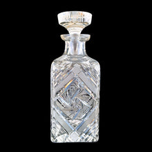 Load image into Gallery viewer, Introduce elegance and sophistication to your bar with this elegant heavy-weighted vintage cut lead crystal &quot;Pinwheel&quot; glass liquor decanter. The intricate design and expert craftsmanship will impress any liquor connoisseur and add a touch of sparkle to your barware collection.  In excellent condition, free from chips. Tiny minor scuff on the underside of the stopper.  Measures 3 5/8 x 3 5/8 x 9 1/2 inches   
