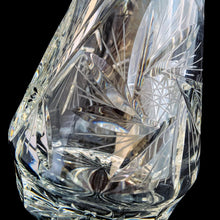 Load image into Gallery viewer, Vintage cut crystal liquor teardrop decanter featuring a pattern of pinwheels and fans. Crafted in Germany, circa 1950s. Add this eye catching crystal to your bar cart!

In excellent condition, no chips.

Measures 3 3/4 x 12 inches

Capacity 1 pint or 500ml
