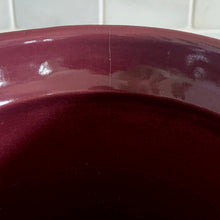 Load image into Gallery viewer, Vintage art deco plum stoneware vase featuring repeating columns of stacked palm leaves. Crafted by Robinson Ransbottom Pottery Co., USA, 1930s. A beautiful piece to add to your art pottery collection!

In as found condition, hairline crack at the rim (see photos), no chips/repairs. Typical manufacturing glaze pops. Unmarked.

Measures 6 1/4 x 10 1/4 inches

