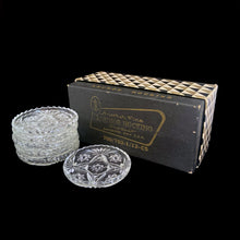 Load image into Gallery viewer, Vintage set of six Prescut Clear pressed glass coasters featuring a pattern of stars and pinwheels with a sawtooth rim. Crafted by Anchor Hocking, 1960s. Keep your furniture and tablecloths free from stains with these beauties.

In excellent condition, no chips. In original box.

Measures 3 1/4 x 1/2 inches
