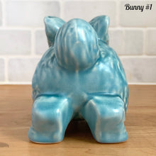 Load image into Gallery viewer, Vintage Easter bunny figurine back view Price Bros Burslem England 1950s aqua blue ceramic cottageware collectible
