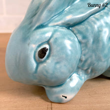 Load image into Gallery viewer, Close-up detail vintage Price Bros Easter bunny 1950s English ceramic craftsmanship aqua blue cottageware collectible show manufacturer's defect on the front foot
