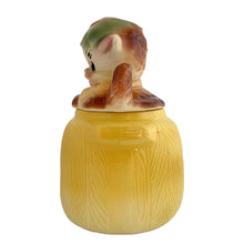 Load image into Gallery viewer, Adorable vintage, mid-century era Pup in the Pot ceramic cookie jar. Crafted by American Bisque, 1950s. A delightful addition to your cookie jar collection and kitchen decor!

In as found vintage condition, no chips, hairline fracture to the base, normal crazing commensurate with age.

Measures 6 1/2 x 6 x 11 1/2 inches
