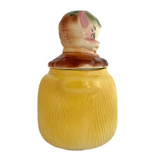 Load image into Gallery viewer, Adorable vintage, mid-century era Pup in the Pot ceramic cookie jar. Crafted by American Bisque, 1950s. A delightful addition to your cookie jar collection and kitchen decor!

In as found vintage condition, no chips, hairline fracture to the base, normal crazing commensurate with age.

Measures 6 1/2 x 6 x 11 1/2 inches
