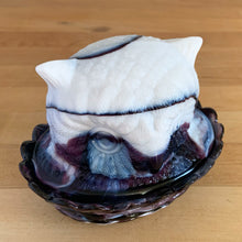 Load image into Gallery viewer, Rare vintage purple amethyst slag glass Owl-on-Nest covered bon bon dish. Crafted by LG Wright Glass, USA, 1959 - 1985. Perfect to store candies, trinkets, soap or beauty needs. Add this sweet piece of history to your glass or owl collection!  In excellent condition, no chips.  Measures 5 3/8 x 4 1/8 x 4 1/4 inches
