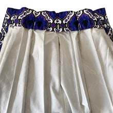 Load image into Gallery viewer, Transform any room into a vintage paradise with this pair of vibrant geometric, fully lined,&nbsp;pinch pleat curtain panels in bold shades of purple, blue, black, white and gold. The impeccable craftsmanship tells us they were made professionally made. An easy way to add mid mod flair and character to your home decor.

In excellent like-new condition, free from stains/tears measures 22 inches wide at the top, 40 inches wide at the bottom, 84 inches in length with a 3 1/4 inch hem. Includes 14 stainles
