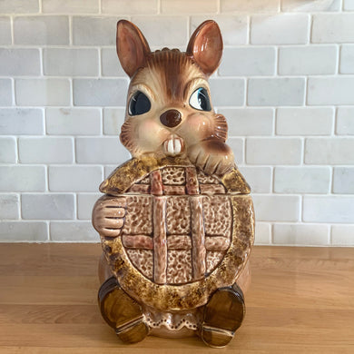 Adorable vintage, mid-century era anthropomorphic ceramic rabbit cookie jar. Crafted by Royal Sealy, Japan, 1950s. A delightful addition to your cookie jar collection and kitchen decor!

In as found vintage condition, with 2 chips to the rim of the lid and a well executed repair to one ear, see photos. No cracks and typical age-related crazing.

Measures 6 x 7 1/4 x 13 1/4 inches