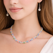 Load image into Gallery viewer, This rare vintage set delivers timeless glamour with a playful pop of color—ideal for special occasions, statement styling, or collectors seeking a complete Swarovski look. Worn together or styled separately, these pieces bring unmistakable vintage luxury and shine.

In excellent condition.

Necklace measures 18 inches

Earrings have a 1 inch drop
