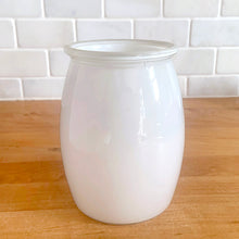 Load image into Gallery viewer, Vintage mid-century Circus Clowns white glass canister painted with red clown and circus motif. No lid. Crafted by Bartlett Collins, 1950s. A sweet sized jar to store dry goods and add whimsy to your kitchen decor.

In excellent condition, no chips.

Measures 4 x 5 1/2 inches
