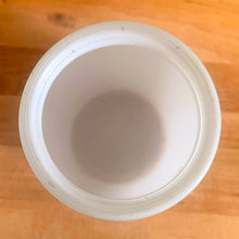 Load image into Gallery viewer, Vintage mid-century Circus Clowns white glass canister painted with red clown and circus motif. No lid. Crafted by Bartlett Collins, 1950s. A sweet sized jar to store dry goods and add whimsy to your kitchen decor.

In excellent condition, no chips.

Measures 4 x 5 1/2 inches
