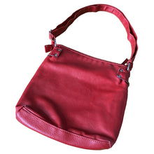 Load image into Gallery viewer, Vintage red faux leather crossbody purse, featuring zippered closure, adjustable strap, snap and zippered exterior pockets, purple interior with one zippered, two open pockets. Crafted by Emilie M.

In excellent vintage condition, see photos.

Measurements with strap 9 x 35 inches

Measurements without strap 9 x 9 3/4 inches
